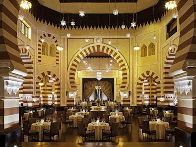Interior of the historic 1902 Restaurant featuring high arches and intricate patterns.
