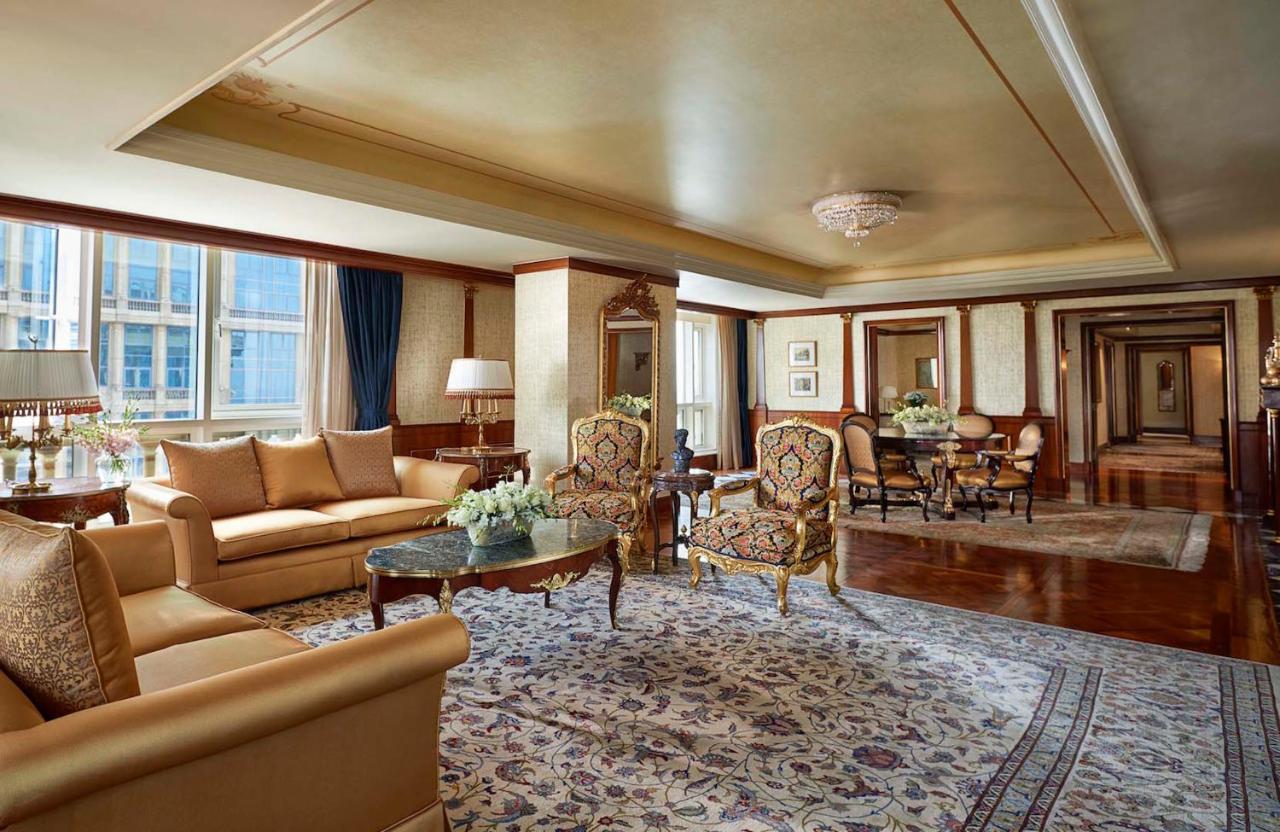 Four Seasons Hotel Cairo at The First Residence with a luxurious pool area and cityscape views