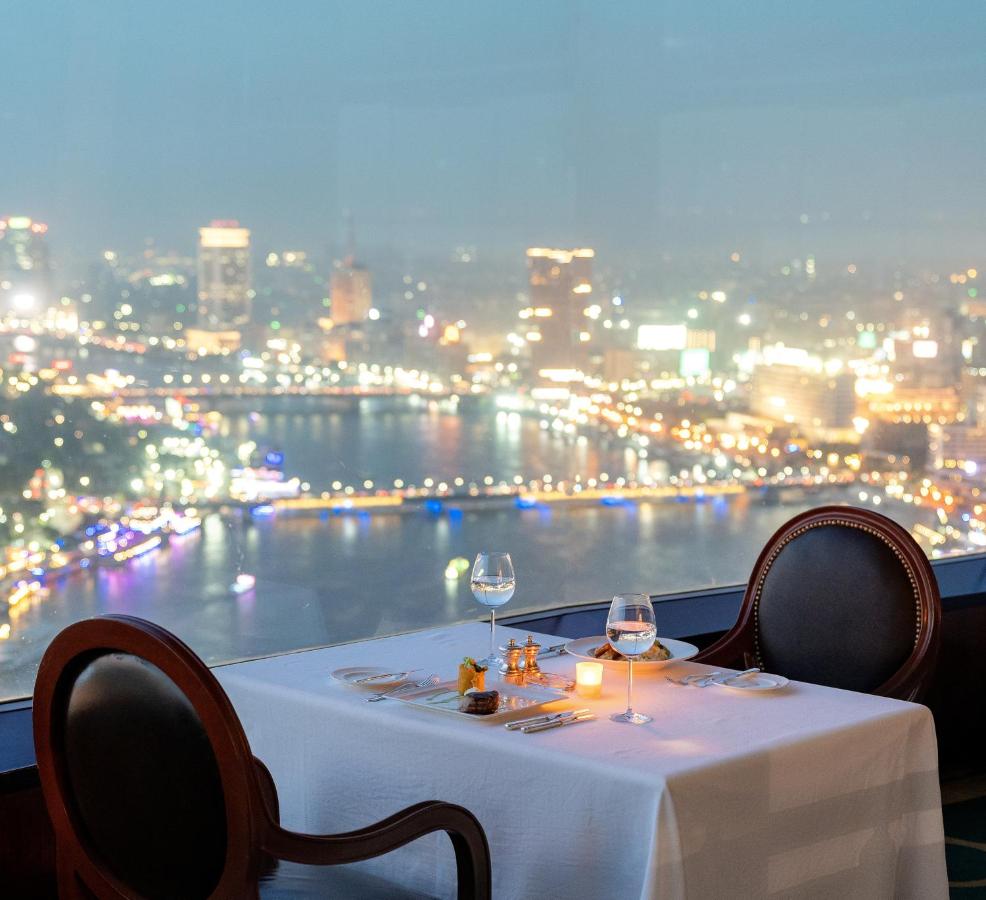 Grand Nile Tower Hotel in Cairo with a panoramic view of the Nile River