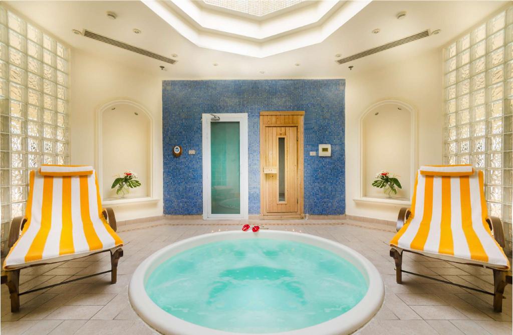 Hilton Alexandria Green Plaza Hotel with modern design and inviting outdoor pool area