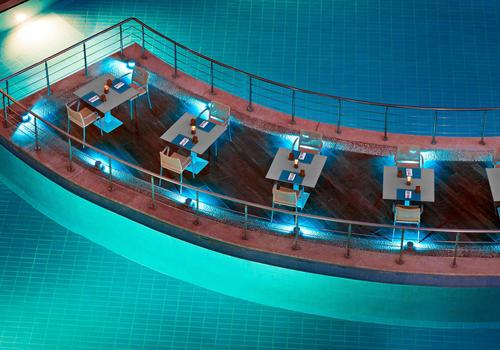 Le Meridien Pyramids Hotel with a view of the pyramids and an inviting pool area