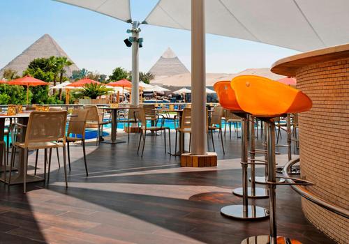 Le Meridien Pyramids Hotel with a view of the pyramids and luxurious pool area