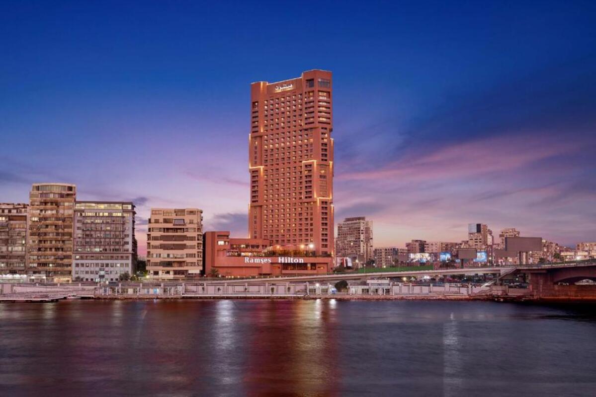 Ramses Hilton Cairo Hotel with a view of the Nile River and city skyline