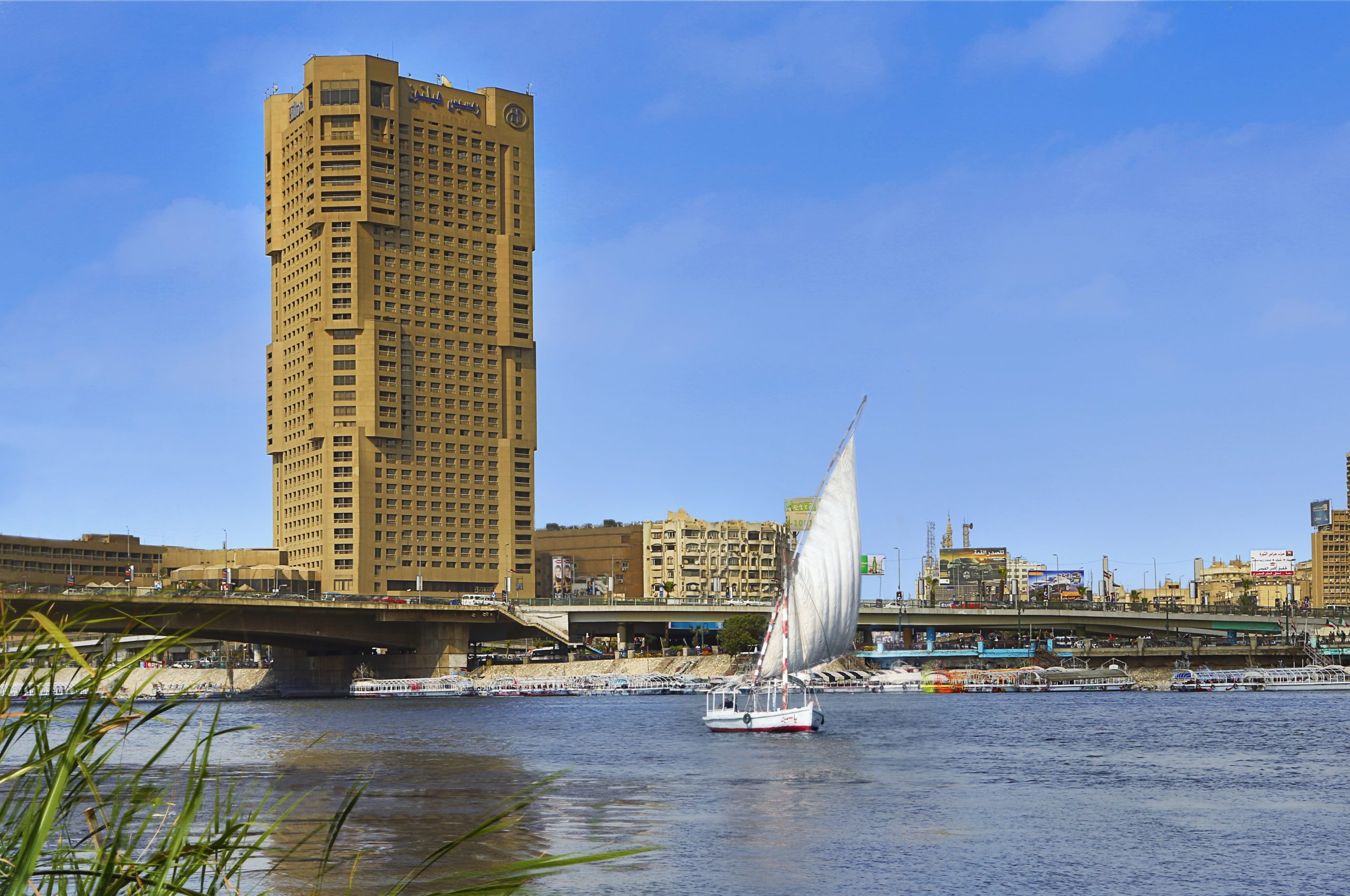 Ramses Hilton Cairo Hotel with a view of the Nile River and cityscape