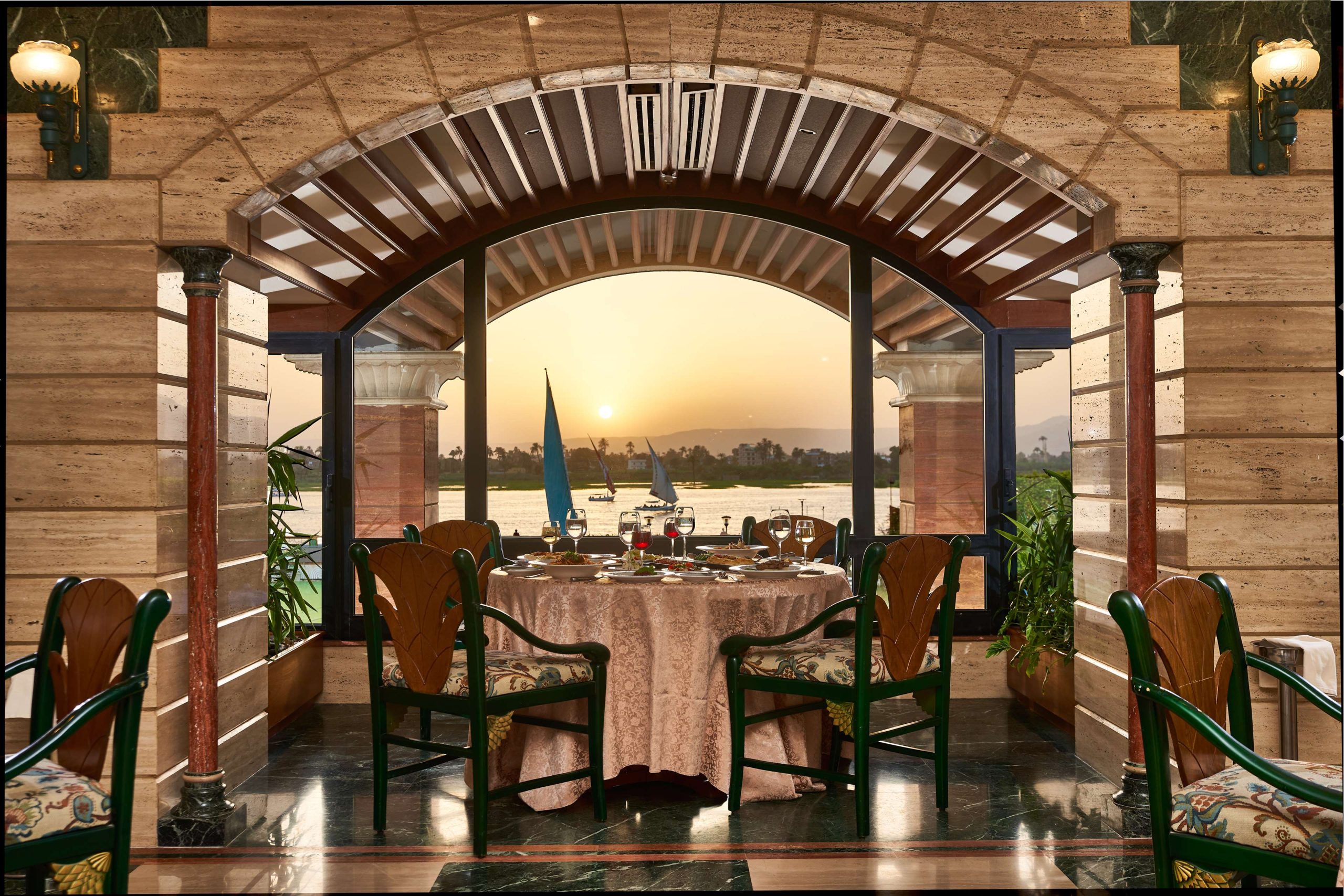 Sonesta St. George Hotel in Luxor with a luxurious pool area and views of the Nile River