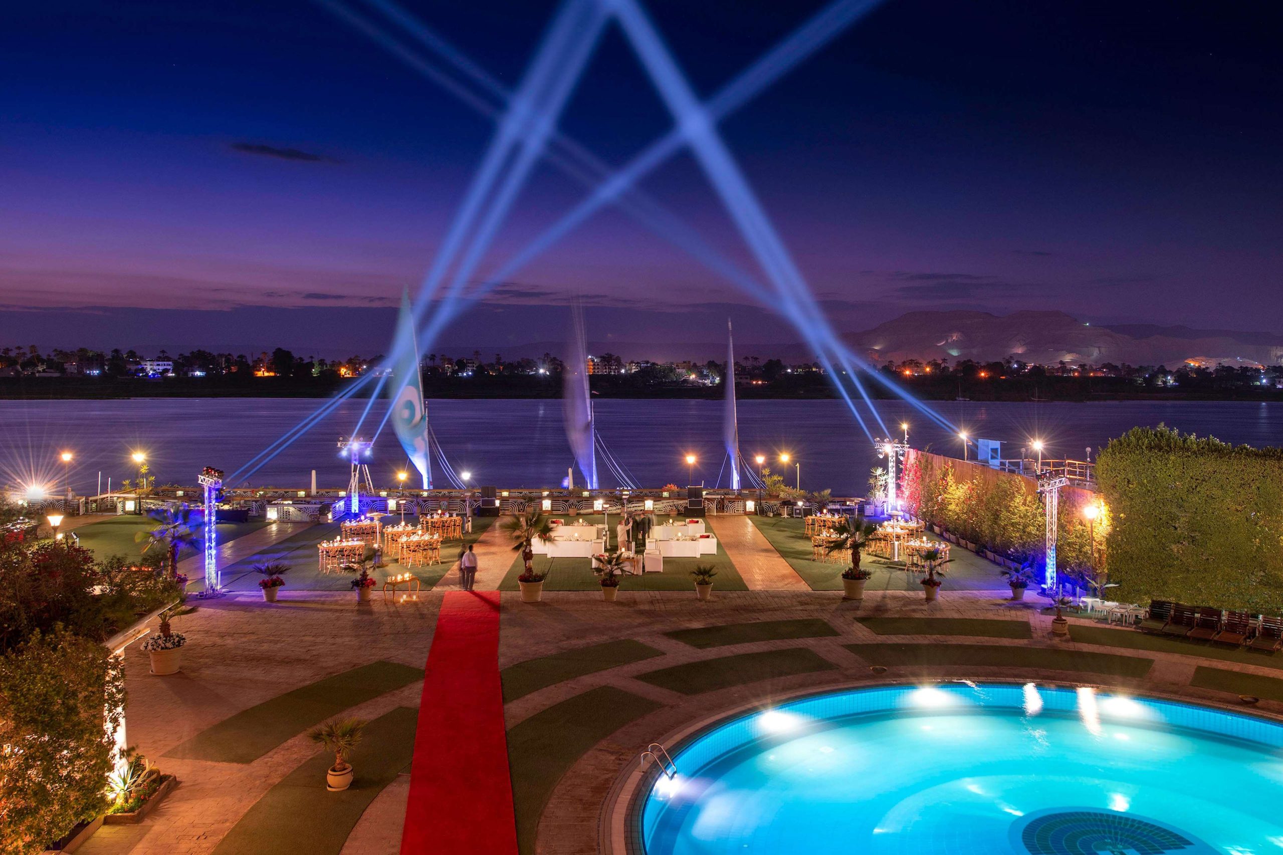Sonesta St. George Hotel in Luxor with a luxurious pool area and views of the Nile River